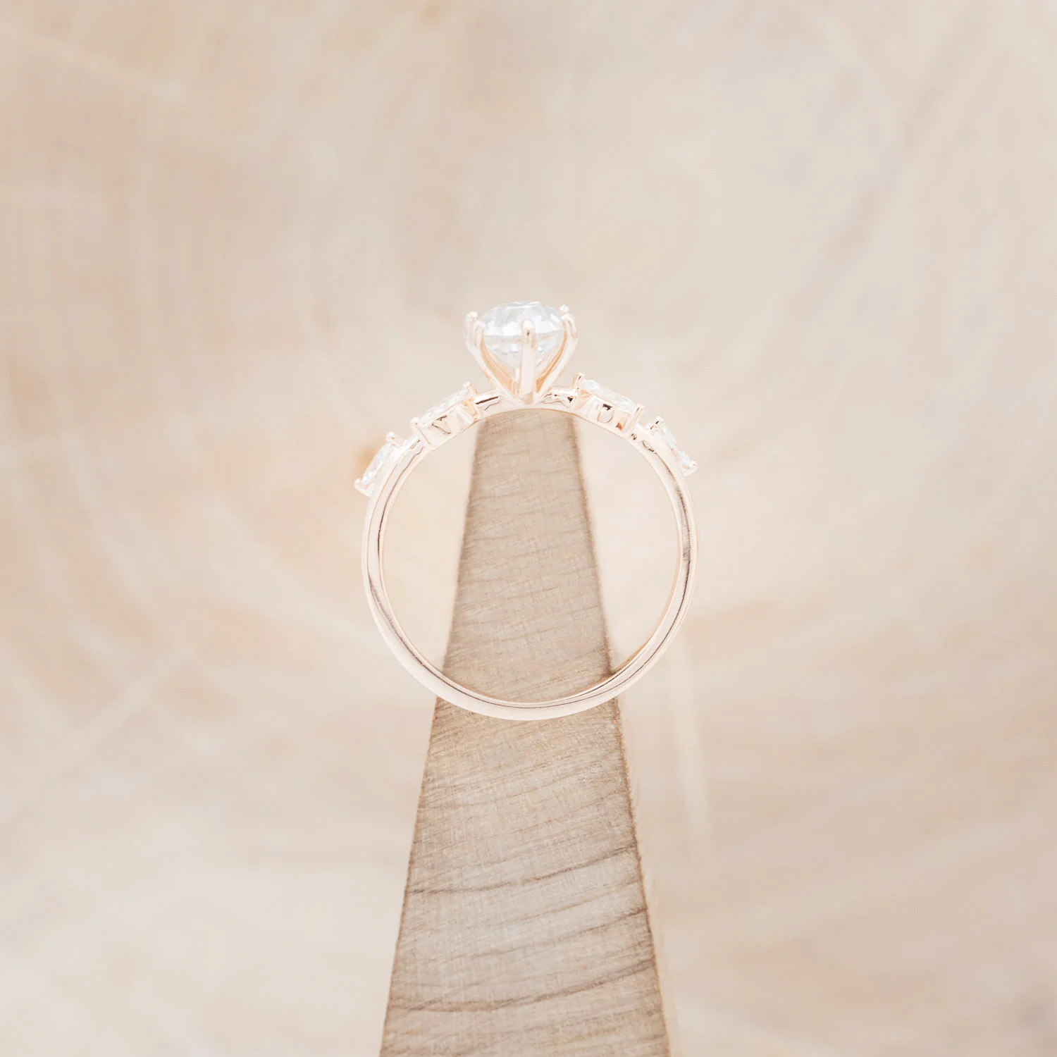 "FLORA" - ROUND CUT MOISSANITE ENGAGEMENT RING WITH MARQUISE CUT DIAMOND ACCENTS - Image 5