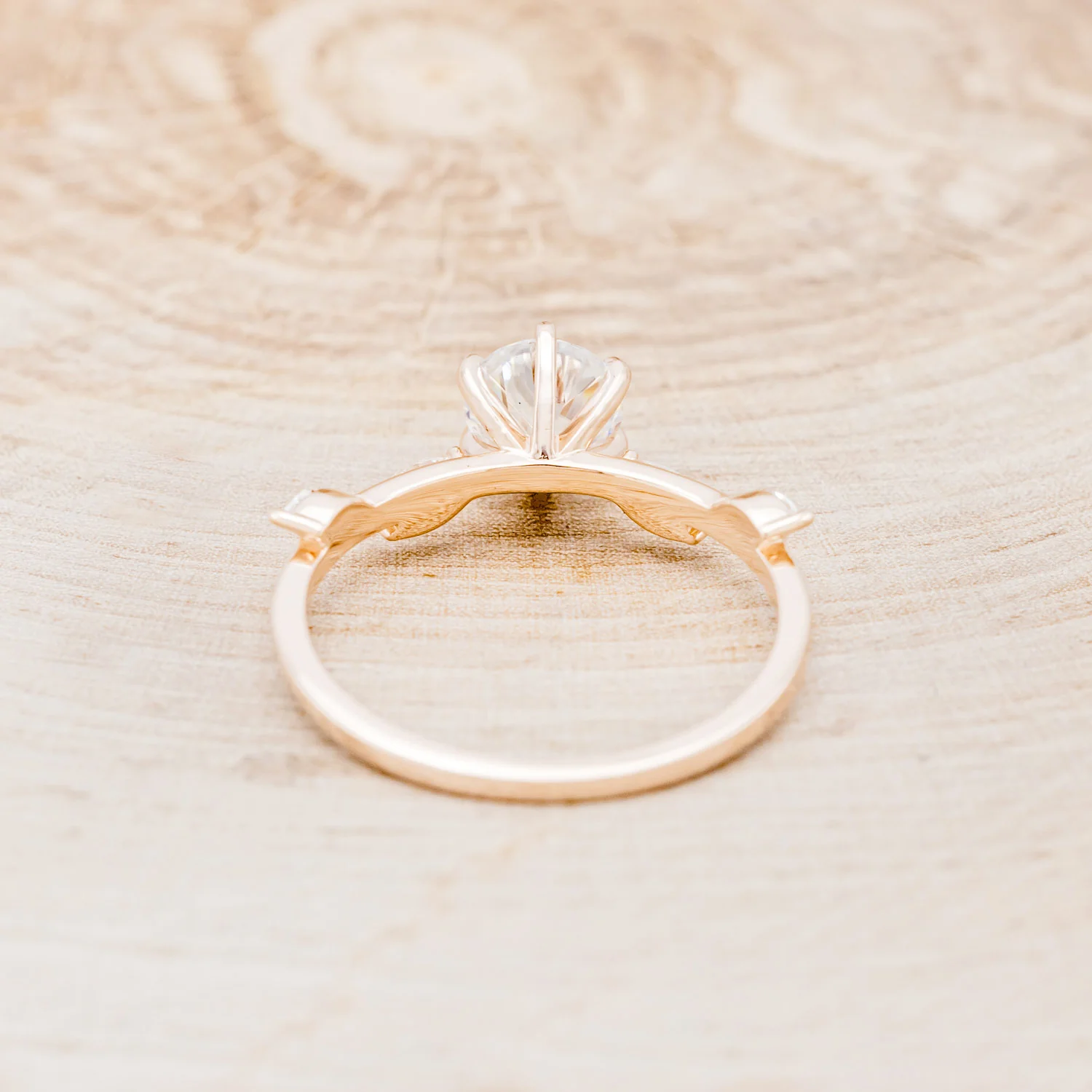 "FLORA" - ROUND CUT MOISSANITE ENGAGEMENT RING WITH MARQUISE CUT DIAMOND ACCENTS - Image 6