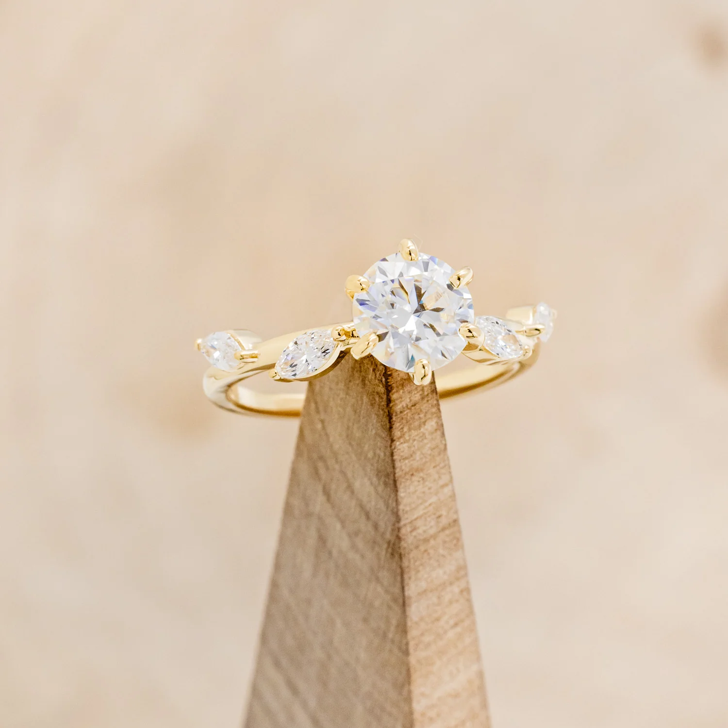 "FLORA" - ROUND CUT MOISSANITE ENGAGEMENT RING WITH MARQUISE CUT DIAMOND ACCENTS - Image 7