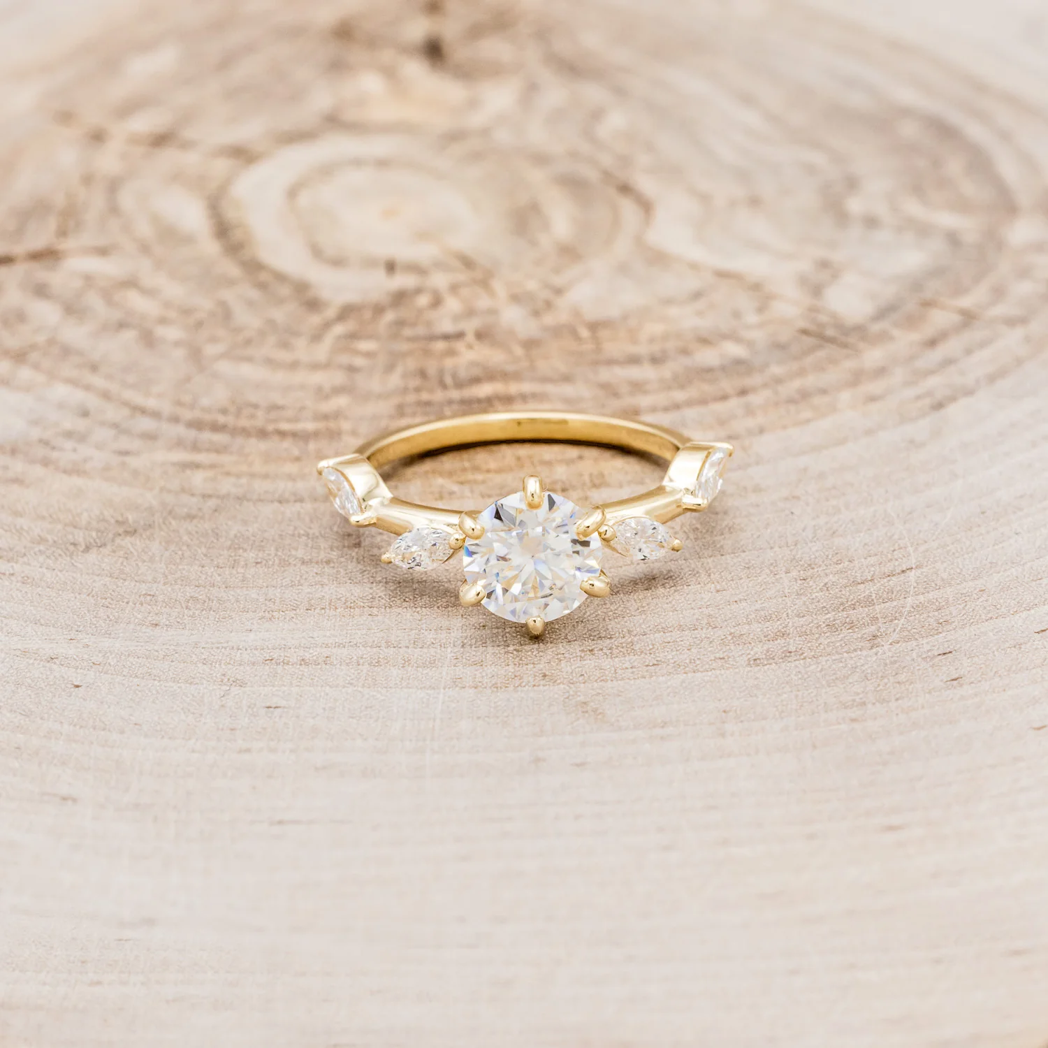 "FLORA" - ROUND CUT MOISSANITE ENGAGEMENT RING WITH MARQUISE CUT DIAMOND ACCENTS - Image 8