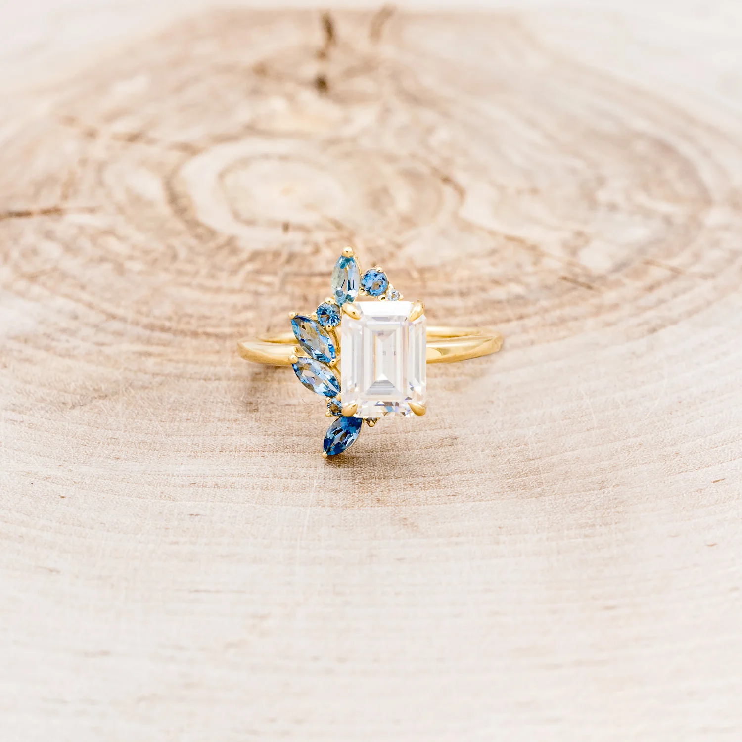 "ISABELLA" - EMERALD CUT MOISSANITE ENGAGEMENT RING WITH AQUAMARINE ACCENTS - Image 4