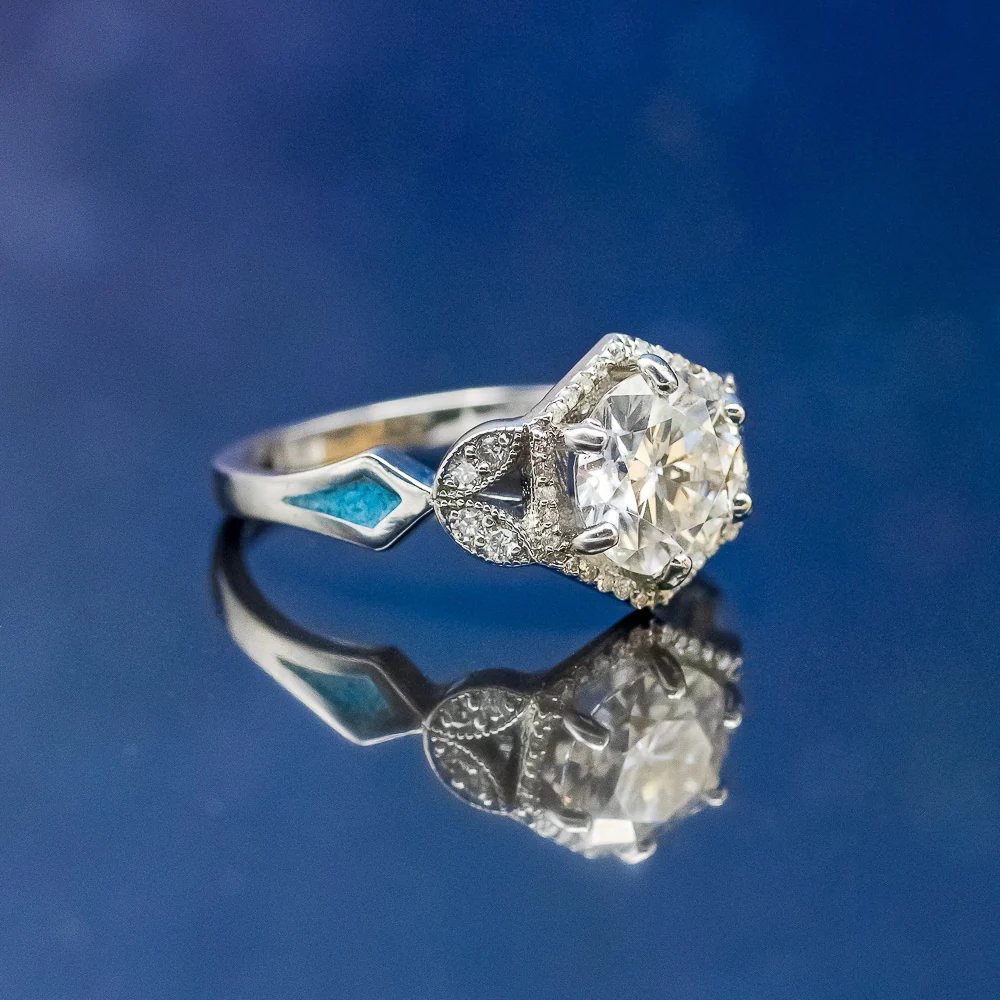 "LUCY IN THE SKY" - ROUND CUT MOISSANITE ENGAGEMENT RING WITH DIAMOND ACCENTS, TURQUOISE INLAYS & A DIAMOND RING GUARD - Image 7