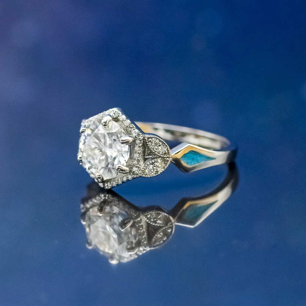 "LUCY IN THE SKY" - ROUND CUT MOISSANITE ENGAGEMENT RING WITH DIAMOND ACCENTS, TURQUOISE INLAYS & A DIAMOND RING GUARD - Image 8