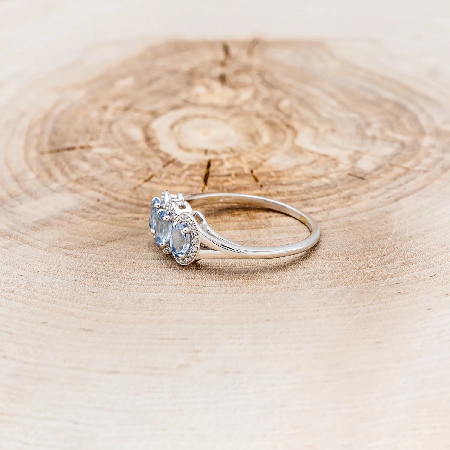 "MERCILLA" - THREE STONE OVAL CUT AQUAMARINE ENGAGEMENT RING WITH DIAMOND ACCENTS - Image 3