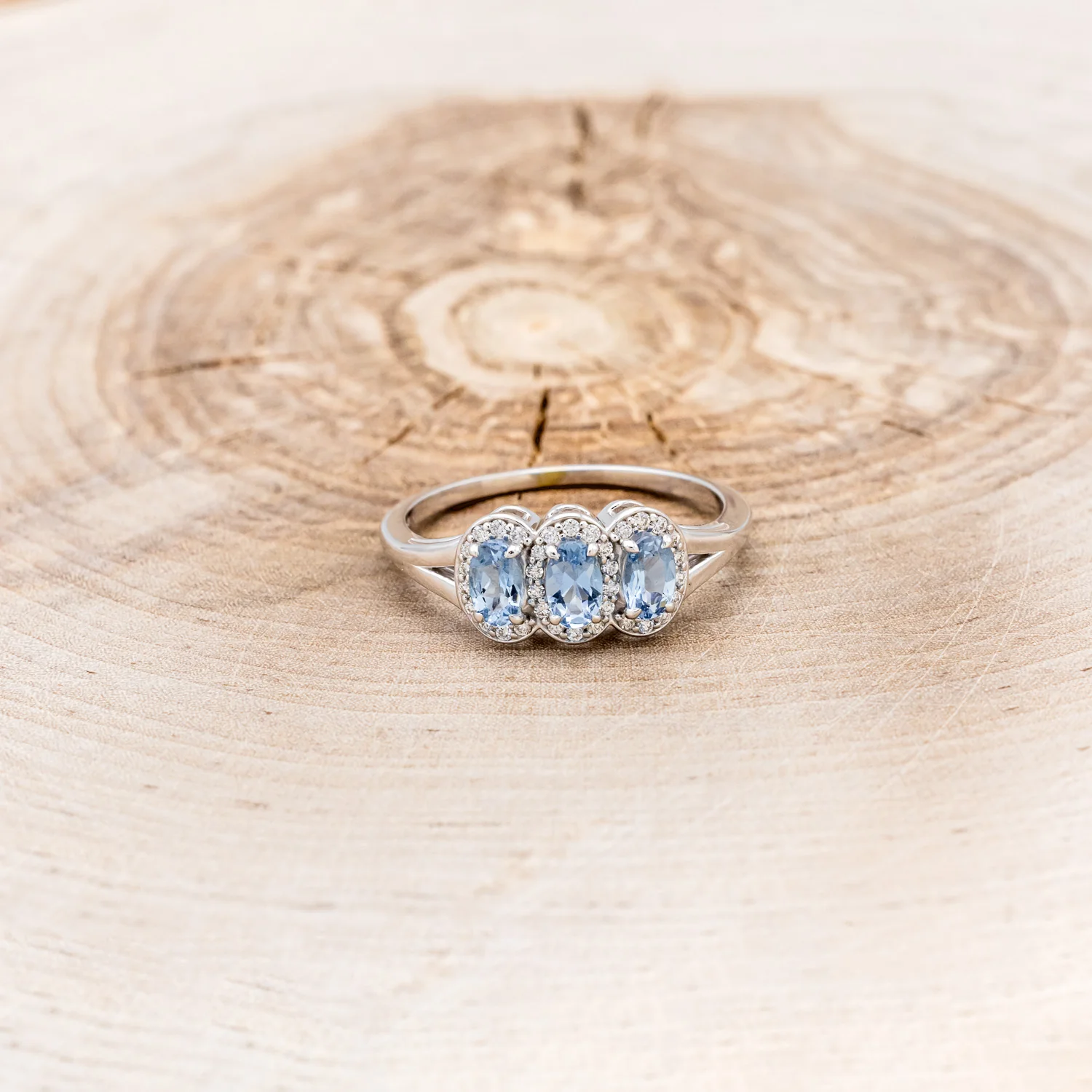"MERCILLA" - THREE STONE OVAL CUT AQUAMARINE ENGAGEMENT RING WITH DIAMOND ACCENTS - Image 4