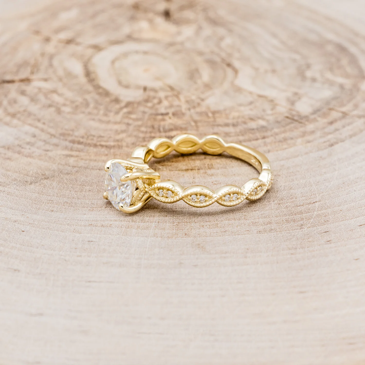 "NAOMI" - ROUND CUT MOISSANITE ENGAGEMENT RING WITH A SCALLOPED BAND AND DIAMOND ACCENTS - Image 3