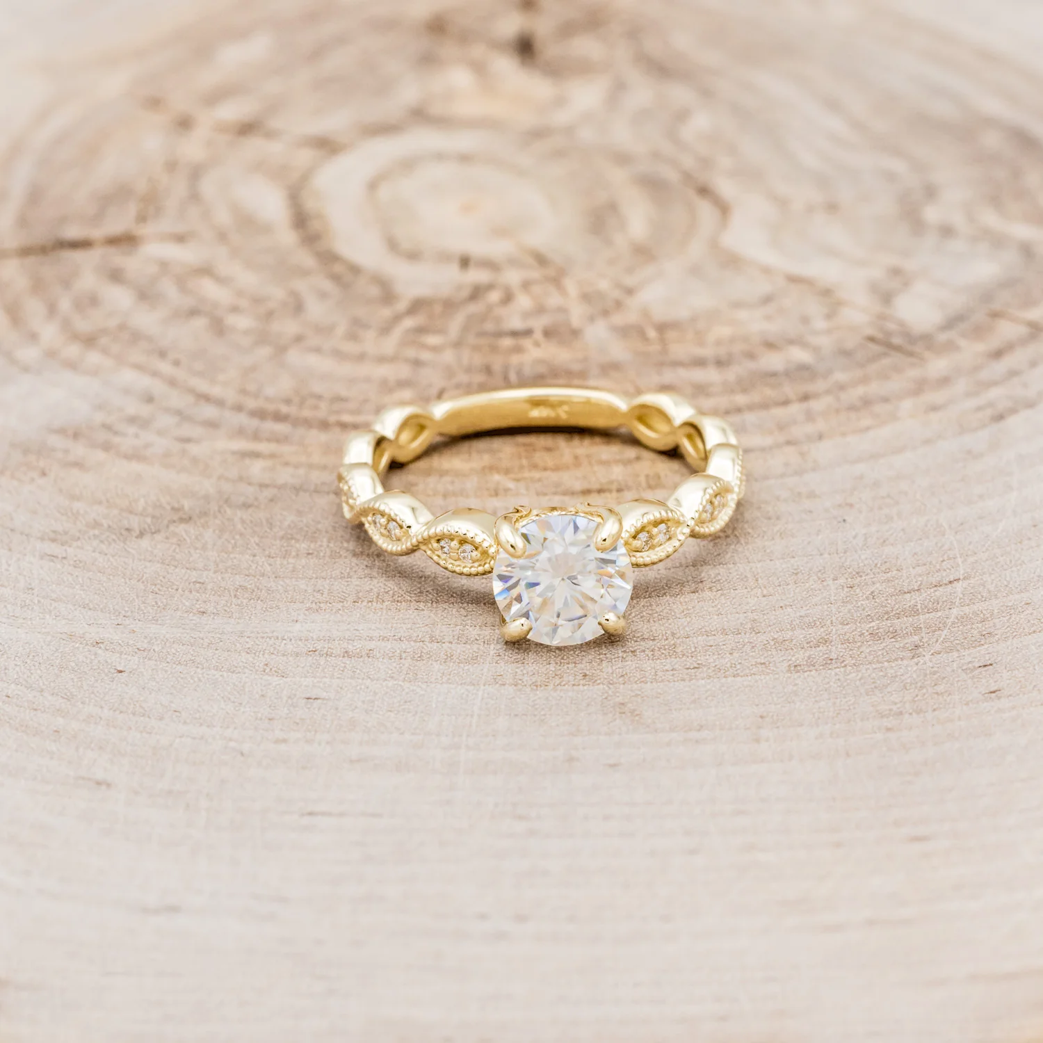 "NAOMI" - ROUND CUT MOISSANITE ENGAGEMENT RING WITH A SCALLOPED BAND AND DIAMOND ACCENTS - Image 4