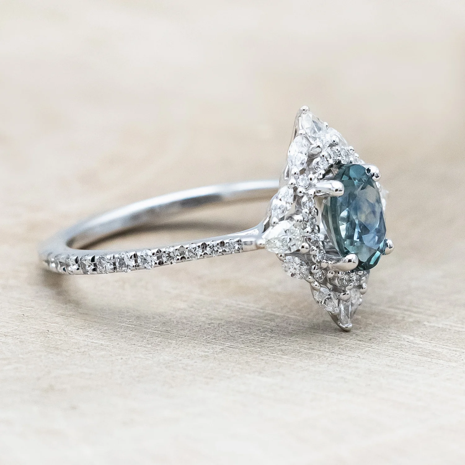 "NORTH STAR" - OVAL CUT MONTANA SAPPHIRE ENGAGEMENT RING WITH DIAMOND HALO & ACCENTS - Image 3