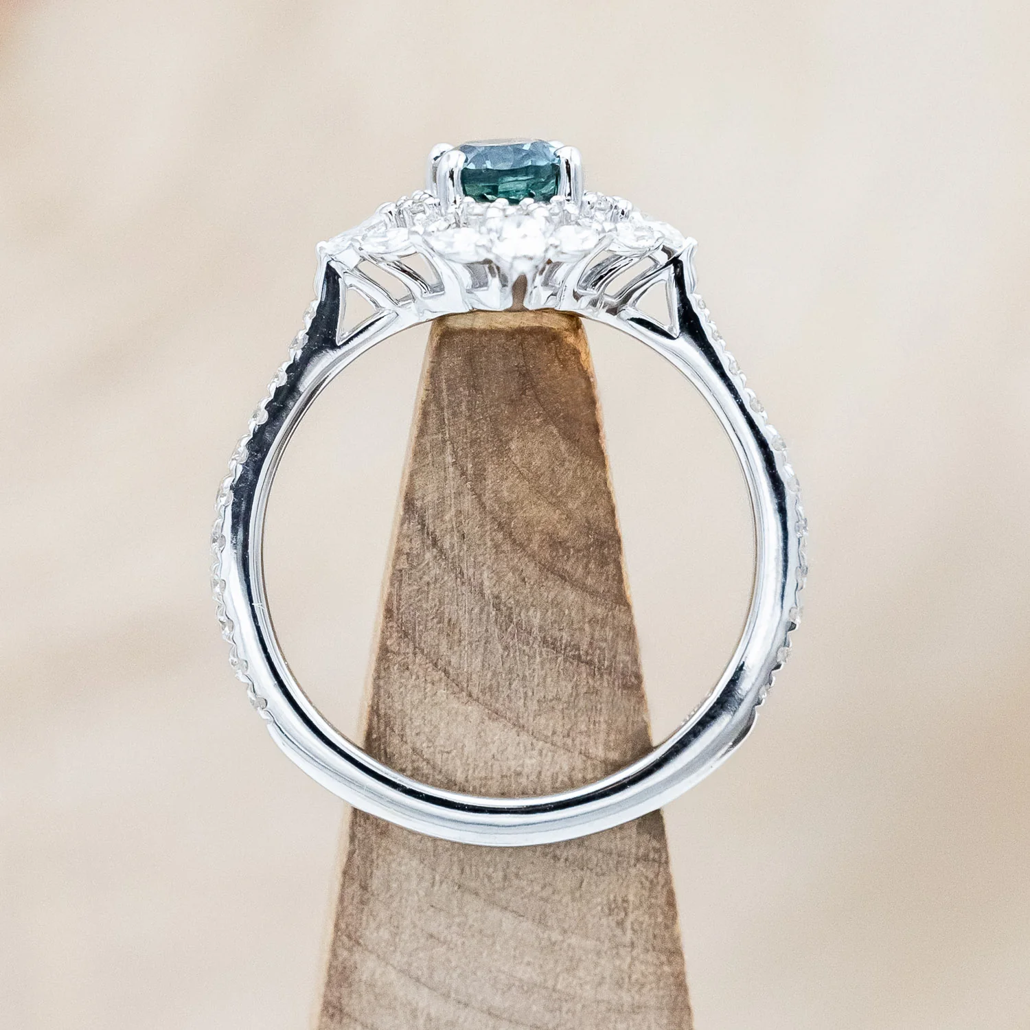 "NORTH STAR" - OVAL CUT MONTANA SAPPHIRE ENGAGEMENT RING WITH DIAMOND HALO & ACCENTS - Image 7