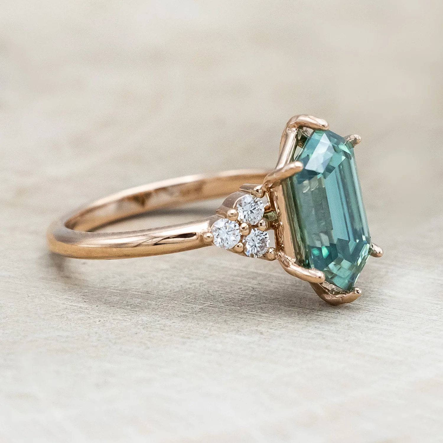 "OCTAVIA" - ELONGATED HEXAGON CUT GREEN MOISSANITE ENGAGEMENT RING WITH DIAMOND ACCENTS - Image 3