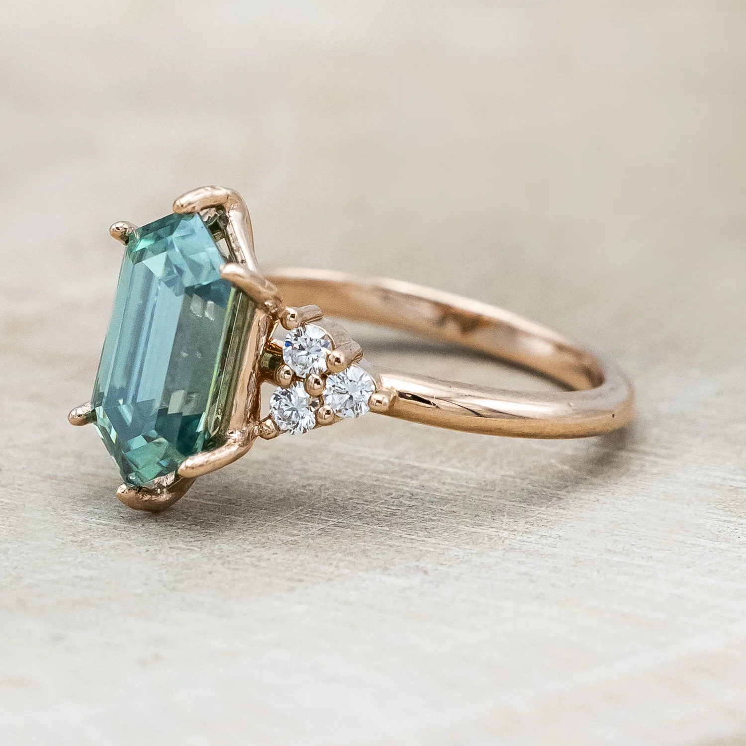 "OCTAVIA" - ELONGATED HEXAGON CUT GREEN MOISSANITE ENGAGEMENT RING WITH DIAMOND ACCENTS - Image 4
