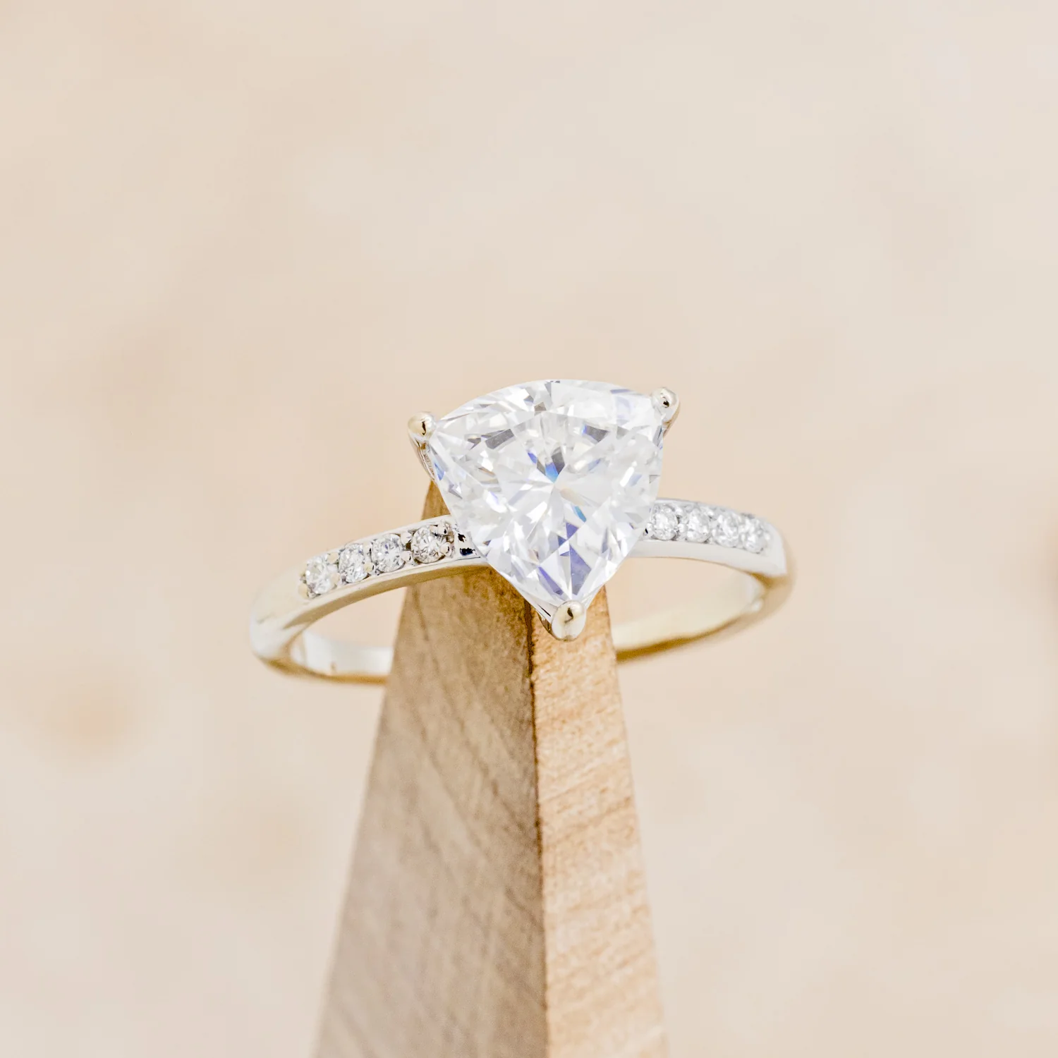 "PIPER" - TRILLION CUT MOISSANITE ENGAGEMENT RING WITH DIAMOND ACCENTS - Image 7