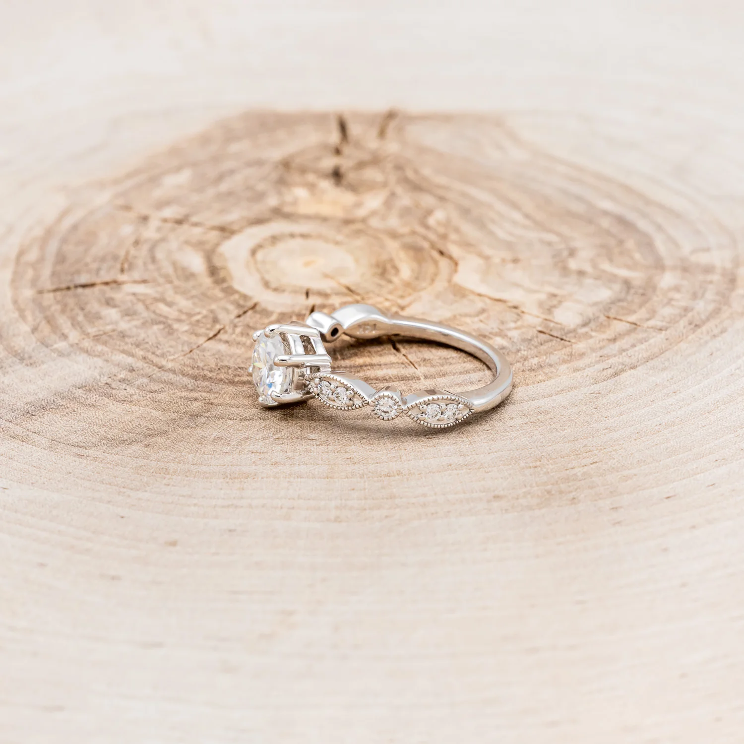 "ANISE" - ROUND CUT MOISSANITE ENGAGEMENT RING WITH DIAMOND ACCENTS - Image 3