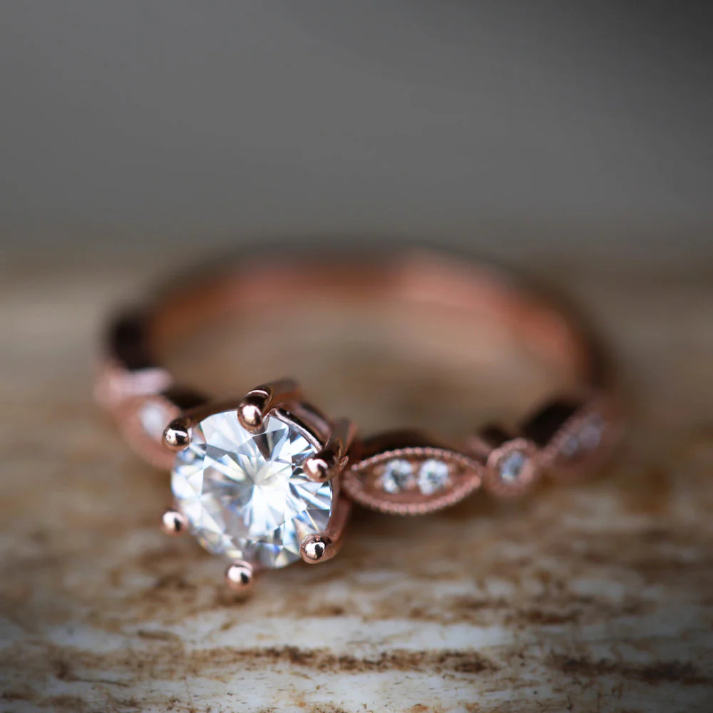"ANISE" - ROUND CUT MOISSANITE ENGAGEMENT RING WITH DIAMOND ACCENTS - Image 7